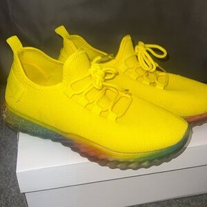 Bright yellow Wanted sneakers with rainbow sole